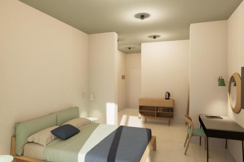 a bedroom with a bed and a desk and a desk at Villa Segetski dvori - Tradition since 1964 in Trogir
