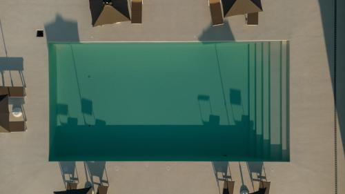 a glass screen on the side of a wall at Agriturismo Pieve San Biagio - Adults Only in Macerata