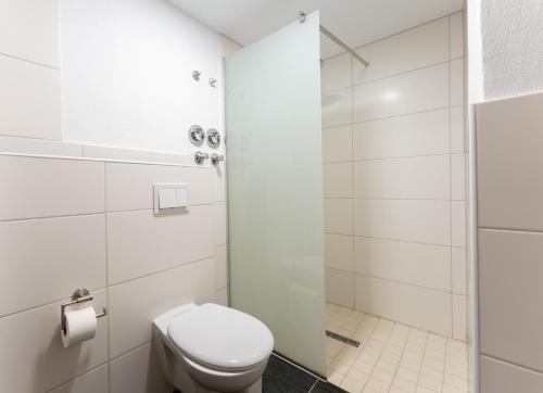 a bathroom with a toilet and a shower at Bakour Fuerteventura La Pared in La Pared