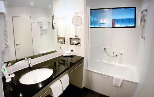 Koupelna v ubytování Novina Hotel Herzogenaurach Herzo-Base