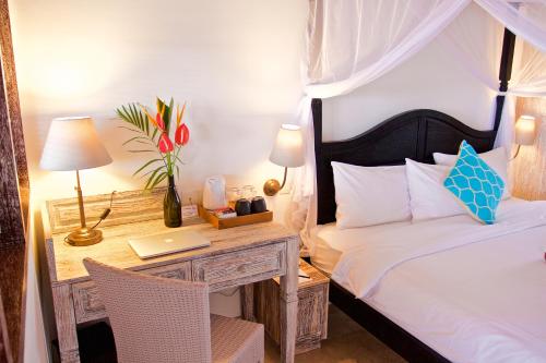 Postel nebo postele na pokoji v ubytování OK Divers Resort & Spa
