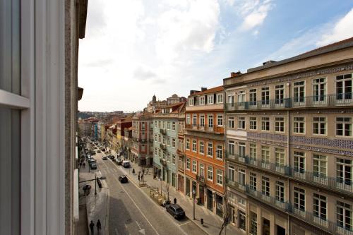 a view of a city street with buildings at RVA - Porto Central Flats in Porto