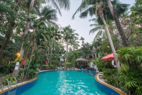 a pool at the resort at The Viridian Resort Patong in Patong Beach
