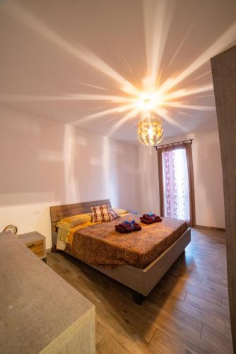 Ένα ή περισσότερα κρεβάτια σε δωμάτιο στο Residence dei Fiori