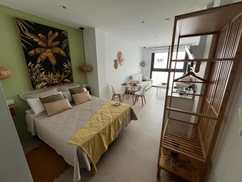 Postel nebo postele na pokoji v ubytování Estudio Nuevo Amanecer 1