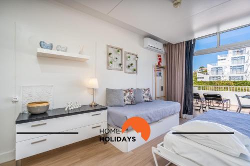 Ένα ή περισσότερα κρεβάτια σε δωμάτιο στο #255 Oura Cilla by Home Holidays