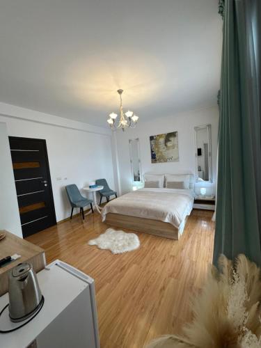 Voodi või voodid majutusasutuse Vila Zoe BucharestAirport&Therme&Parking Otopeni toas