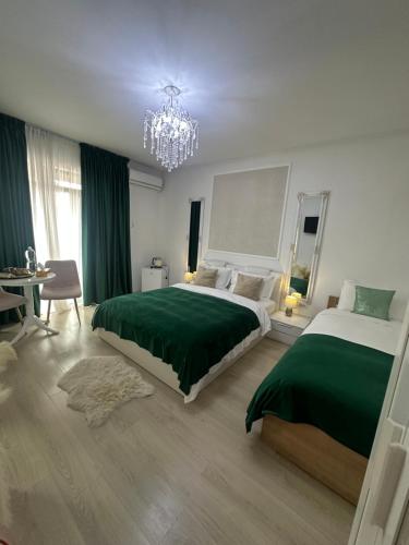 Voodi või voodid majutusasutuse Vila Zoe BucharestAirport&Therme&Parking Otopeni toas