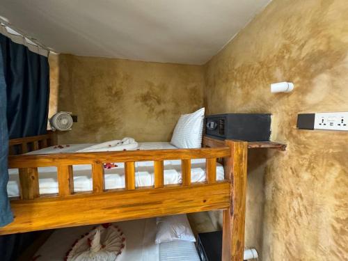 Postel nebo postele na pokoji v ubytování Compass Hostel