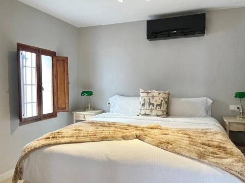 Ένα ή περισσότερα κρεβάτια σε δωμάτιο στο Casa Perla Altea By DelucaCo