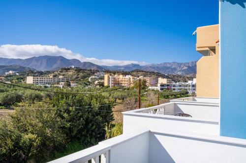 a view of the mountains from the balcony of a house at Iliada Studios in Karpathos Town