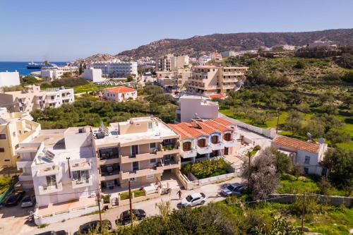 an aerial view of a city with buildings at Iliada Studios in Karpathos Town