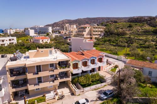 arial view of a building in a city at Iliada Studios in Karpathos Town