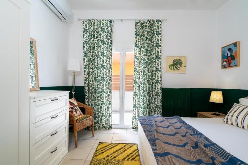 En eller flere senge i et værelse på Coastal Key 5