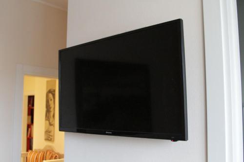 Uma televisão e/ou sistema de entretenimento em B&B I Propilei di San Girolamo