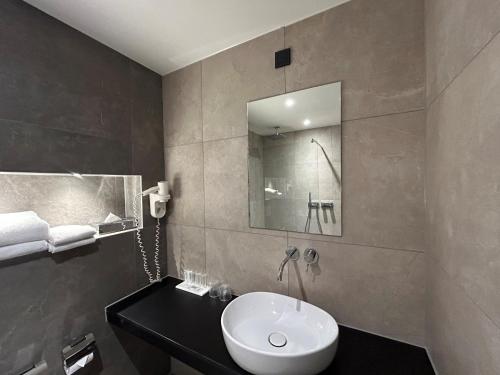 Ένα μπάνιο στο XO Hotels Blue Tower