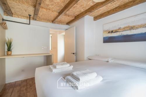 Ένα ή περισσότερα κρεβάτια σε δωμάτιο στο MyHouseSpain - Estancia con encanto en Cudillero