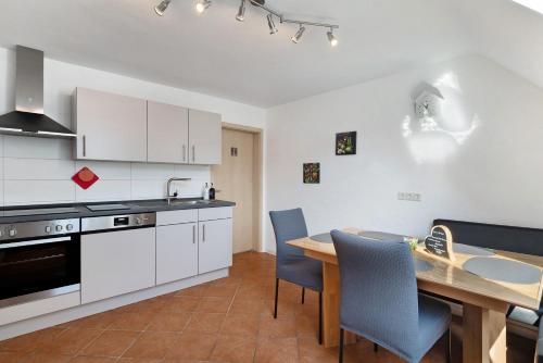 Kuchyň nebo kuchyňský kout v ubytování Ferienwohnungen Hog , Ringsheim