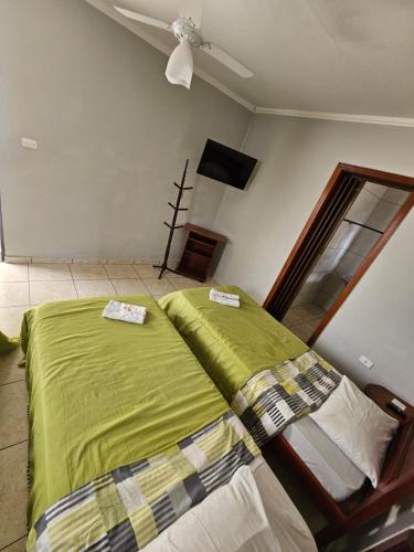 Katil atau katil-katil dalam bilik di Hotel vista alegre