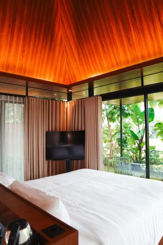 Katil atau katil-katil dalam bilik di Tanawana Borobudur Living