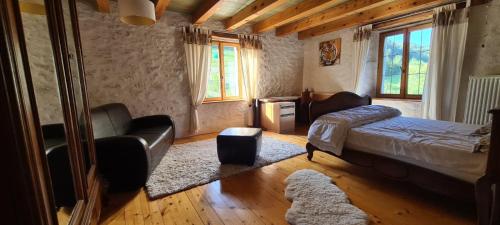 Postel nebo postele na pokoji v ubytování Gîte l'érable