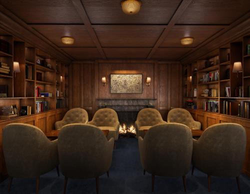 a waiting room with chairs and a fireplace at Sixty DC in Washington