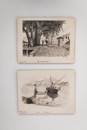 two pictures of two men on a boat in the water at Zmas Studios in Chorto