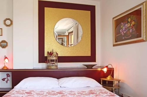 Ένα ή περισσότερα κρεβάτια σε δωμάτιο στο Villa Maura Toscana