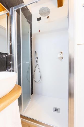a bathroom with a shower and a sink at Villa Italia in Agerola