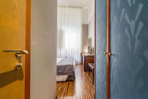 Postel nebo postele na pokoji v ubytování Best Western Hotel Artdeco