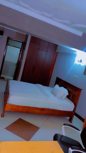Cama o camas de una habitación en Super Paradise Hotel