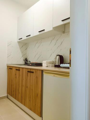 Kuchyň nebo kuchyňský kout v ubytování Alacaster B apartman