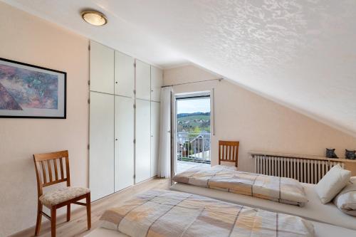 Postel nebo postele na pokoji v ubytování Ferienhaus Lydia