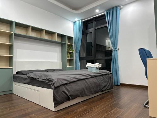 Кровать или кровати в номере Rose house