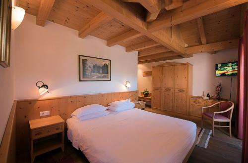 Postel nebo postele na pokoji v ubytování Hotel Waldheim Belvedere