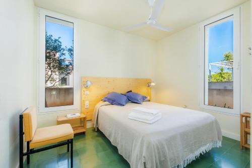 Una cama o camas en una habitación de Villa Mercedes