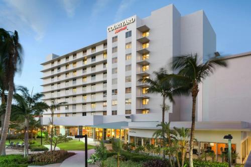 a rendering of the embassy suites anaheim hotel at Courtyard by Marriott Miami Airport in Miami