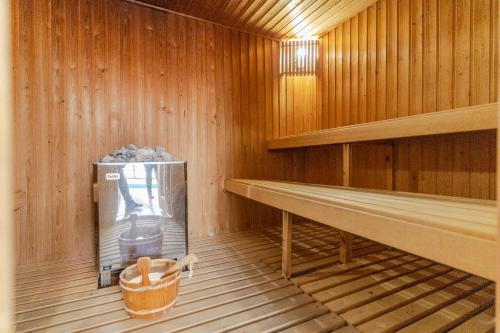 a inside of a sauna with a trash can at RentitSpain Terrazas del sol, Relax Piscina y Golf in Salobreña