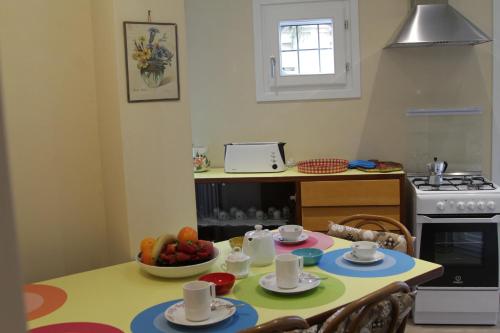 A cozinha ou kitchenette de B&B I Propilei di San Girolamo