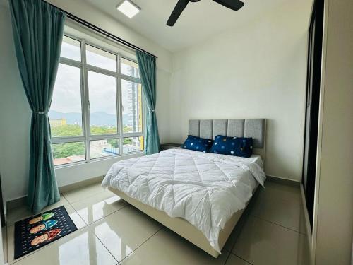 Ένα ή περισσότερα κρεβάτια σε δωμάτιο στο A cozy homestay