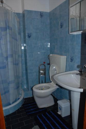 Ένα μπάνιο στο Apartamento Tatiana