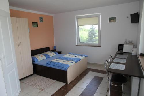 Posteľ alebo postele v izbe v ubytovaní Lorens Family