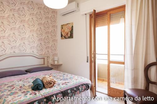 Postel nebo postele na pokoji v ubytování Casa Di Zule