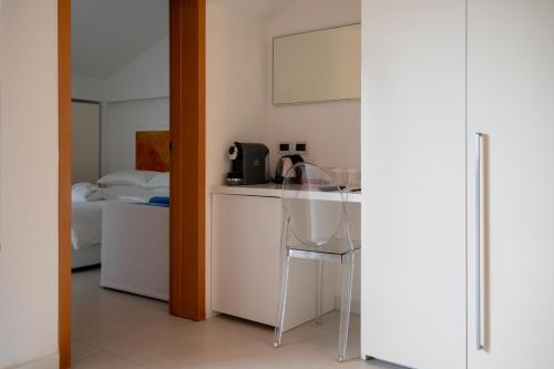Kuchyň nebo kuchyňský kout v ubytování Hotel Savoy