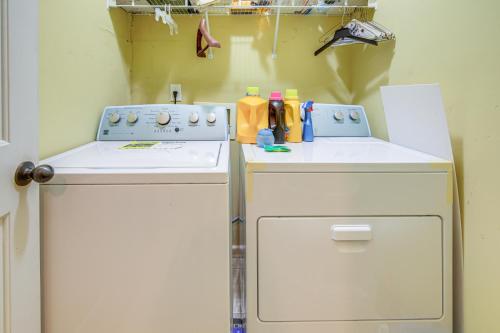 a kitchen with a stove and a dishwasher at Family-Friendly Gem with Home Office in Memphis in Olive Branch