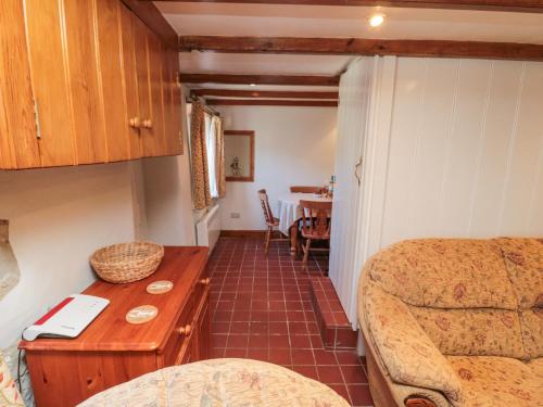 a small room with a bed and a table at Pinjarra in Saltburn-by-the-Sea
