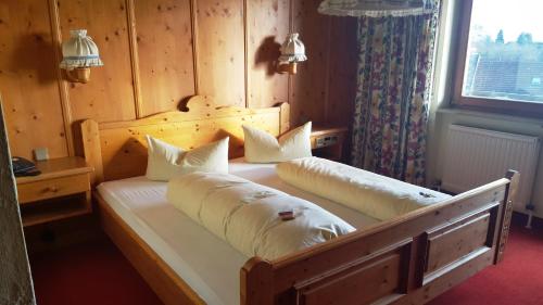 En eller flere senge i et værelse på Meister BÄR HOTEL Bayreuth