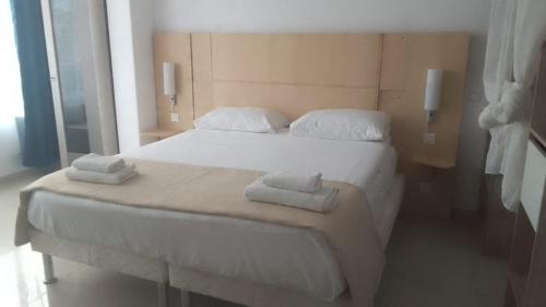 Postel nebo postele na pokoji v ubytování Maison Residencial casa de ferias