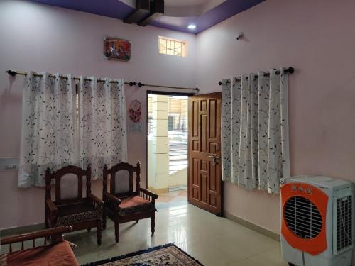 Гостиная зона в Madhuban Homestay 1 Ujjain