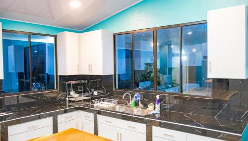 Køkken eller tekøkken på Casa de Playa Ocean Blue SV